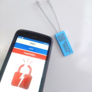 Smartphone scanning RFID security seal showing tampered status after wire cut